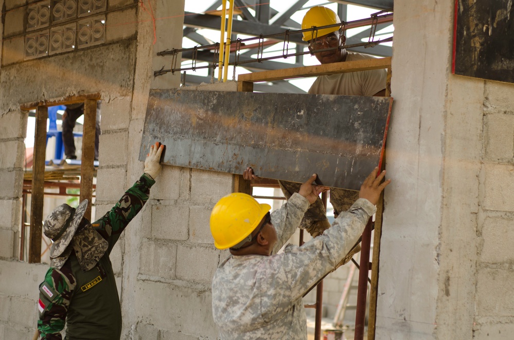 Thai, Indonesian, and US soldiers have you covered: Building school roof for Cobra Gold 2016