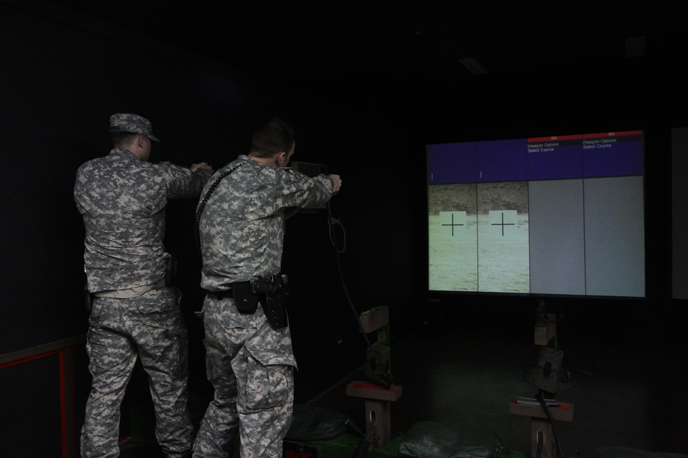 Soldiers use weapons simulator to hone skills in Kosovo