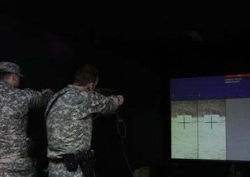 Soldiers use weapons simulator to hone skills in Kosovo