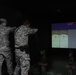Soldiers use weapons simulator to hone skills in Kosovo