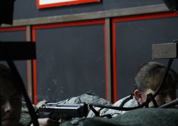 Soldiers use weapons simulator to hone skills in Kosovo