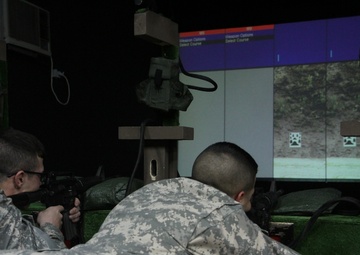 Soldiers use weapons simulator to hone skills in Kosovo