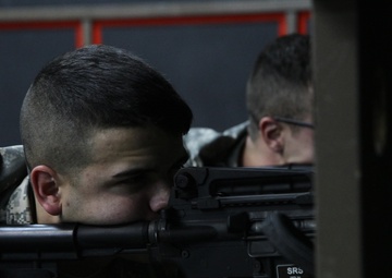 Soldiers use weapons simulator to hone skills in Kosovo
