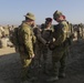 American and Australian forces issue equipment to Iraqi forces