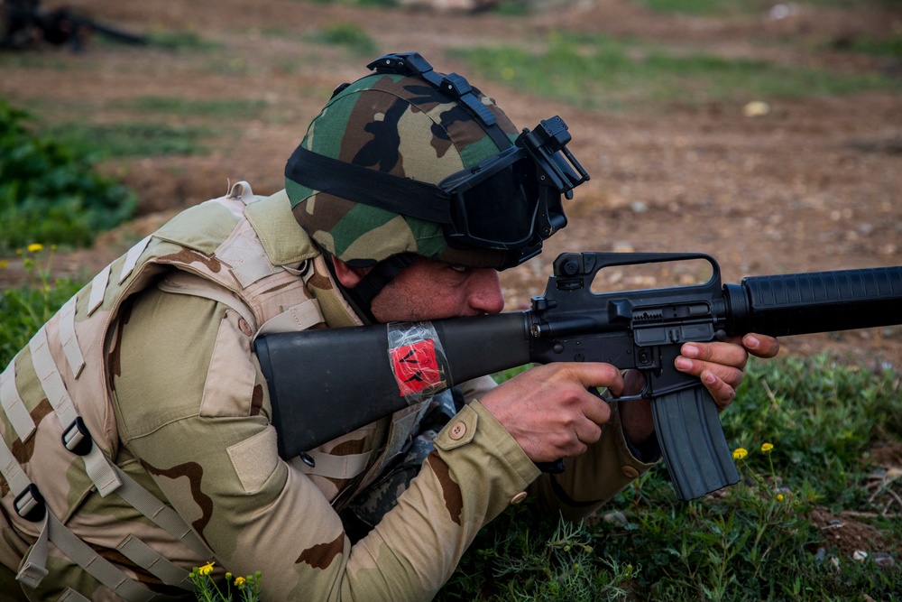 Iraqi soldiers with Nineveh Operations Command conduct live fire range