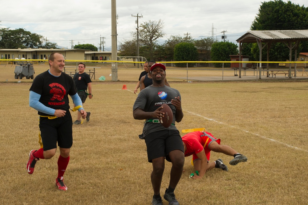 Soto Cano flag football with NFL players, cheerleaders