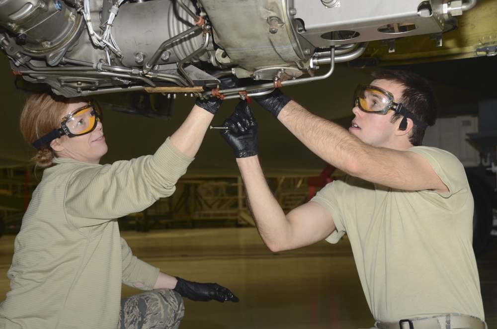 Airmen with the 128th ARW Maintenance Group perform acceptance inspection