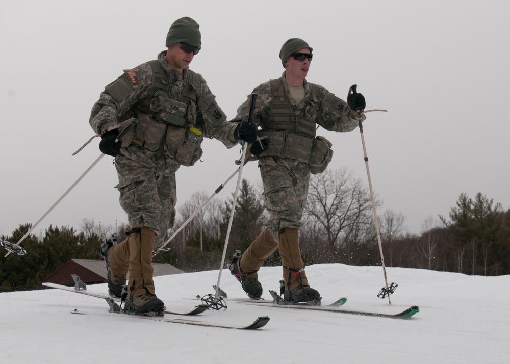 Soldiers ski forward during biathlon exercise