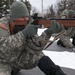 A Soldier fires a .22-caliber rifle during a biathlon exercise