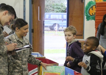 16th CAB soldiers judge elementary school science fair