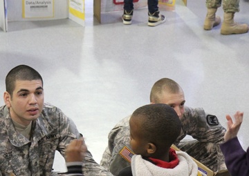16th CAB soldiers judge elementary school science fair