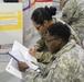16th CAB soldiers judge elementary school science fair