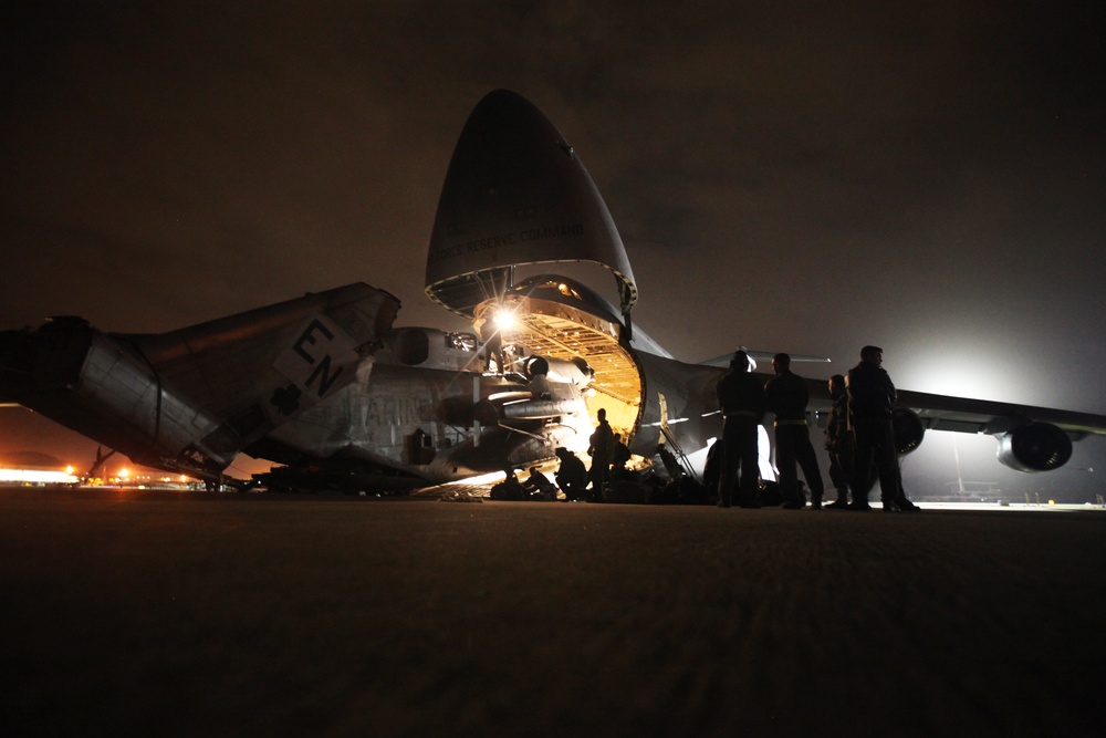 Marines with HMH-464 load CH-53Es in preparation for Operation Cold Response