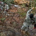 US Army Soldier crosses rope bridge