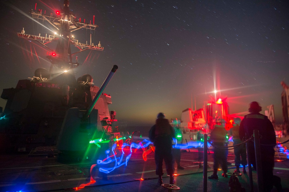 Nighttime replenishment at sea