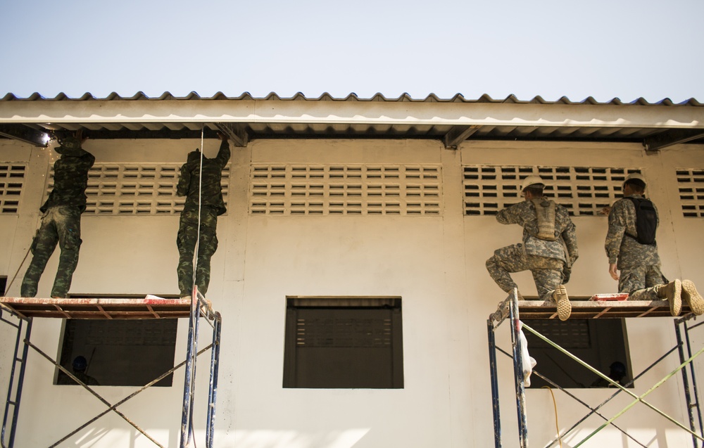 Combined Joint Civil Military Operational Task Force meets with service members at the Ban Raj Bum Roong Middle School