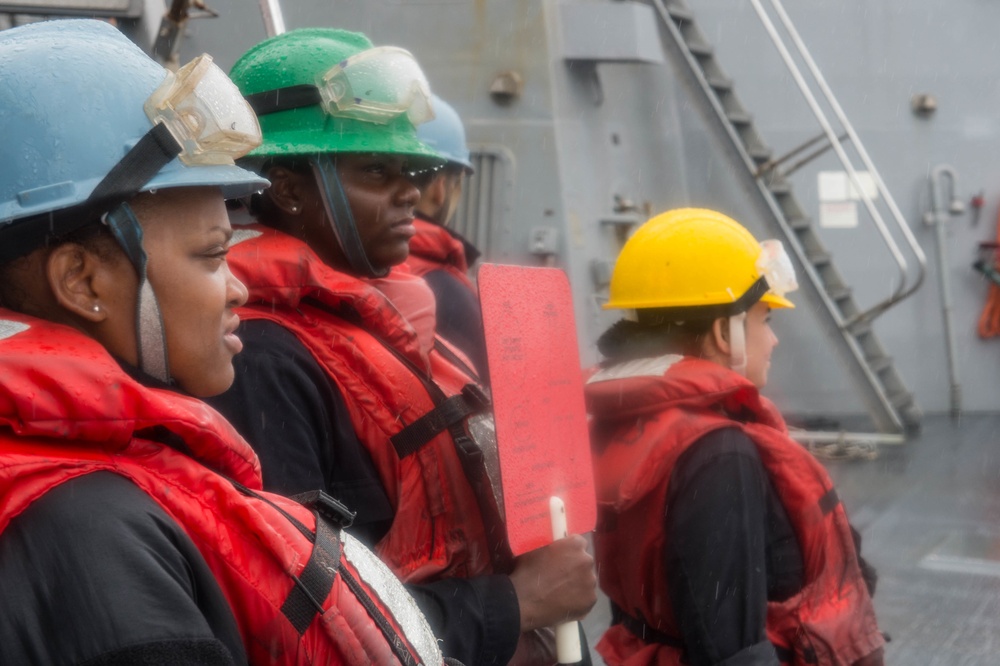 USS Mustin, USNS Carl Brashear conduct replenishment at sea in the Philippine Sea