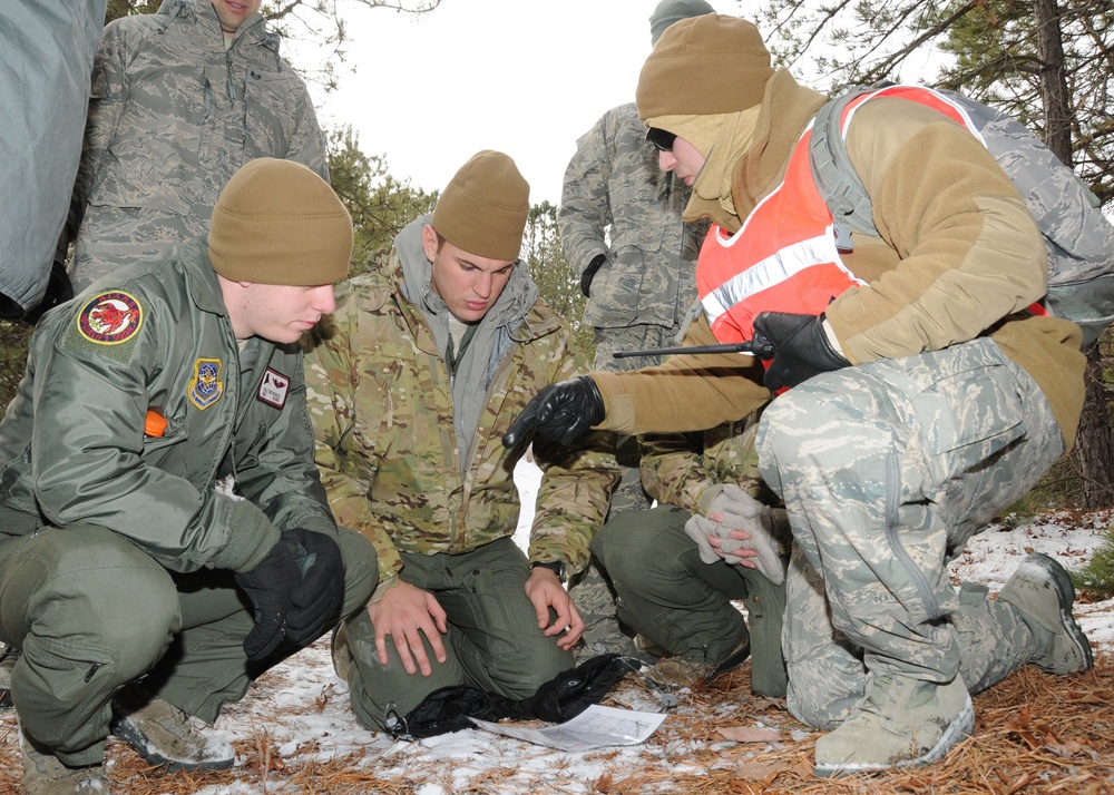 143rd Airlift Squadron Airmen perform survival training