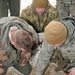 143rd Airlift Squadron Airmen perform survival training
