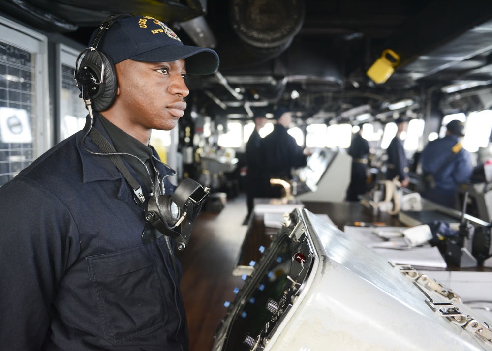 USS Fort McHenry sailor stands watch