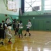 USS Benfold Sailors participate in a COMREL Basketball game with local Otaru high school players