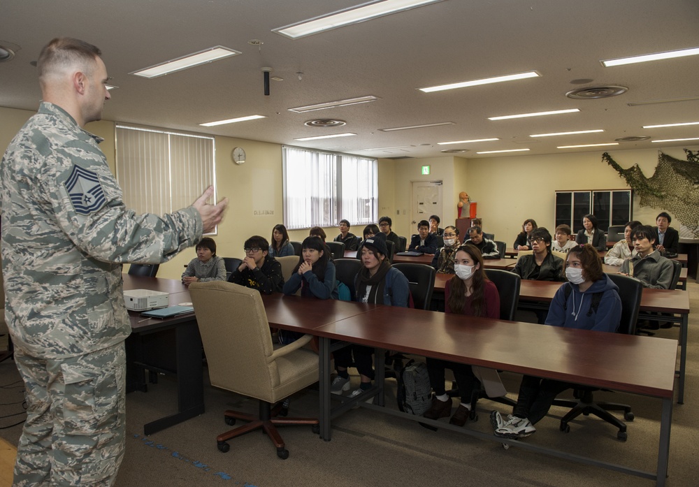 Okinawa International University students visit Kadena
