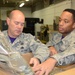 Chief helps Senior Airman William Greene IV, 175th Logistic Readiness Squadron