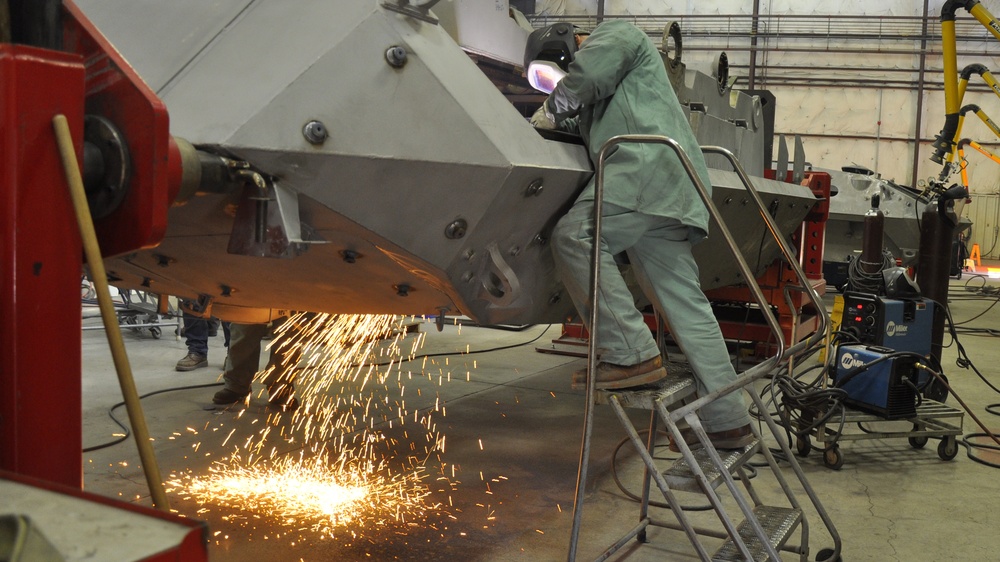 LAV trunnion used to hold and maneuver LAV for welding