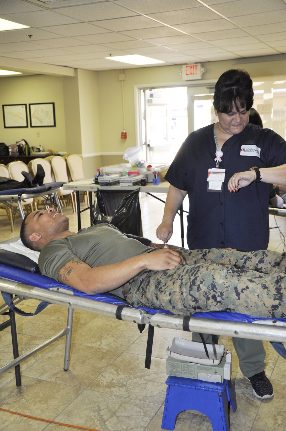 Marine Sgt. Xzavier Wolef, career planner, donates blood during LifeStream event