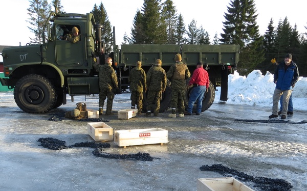 Marine Corps equipment rolls out of classified Norwegian caves
