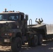 US Army Soldiers attach trailer to truck tractor