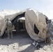 Soldiers set up tent