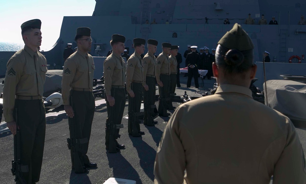 Marines with the 26th MEU participate in rifle detail aboard the USS Arlington