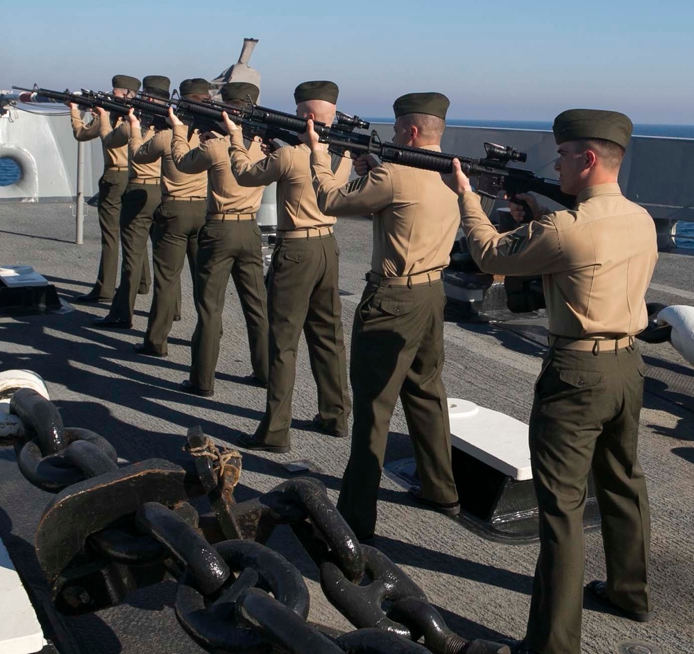 Marines with the 26th MEU participate in rifle detail aboard the USS Arlington