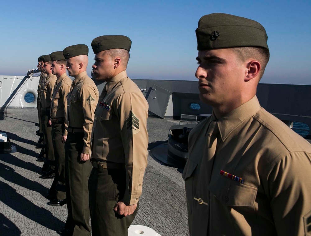 Marines with the 26th MEU participate in rifle detail aboard the USS Arlington