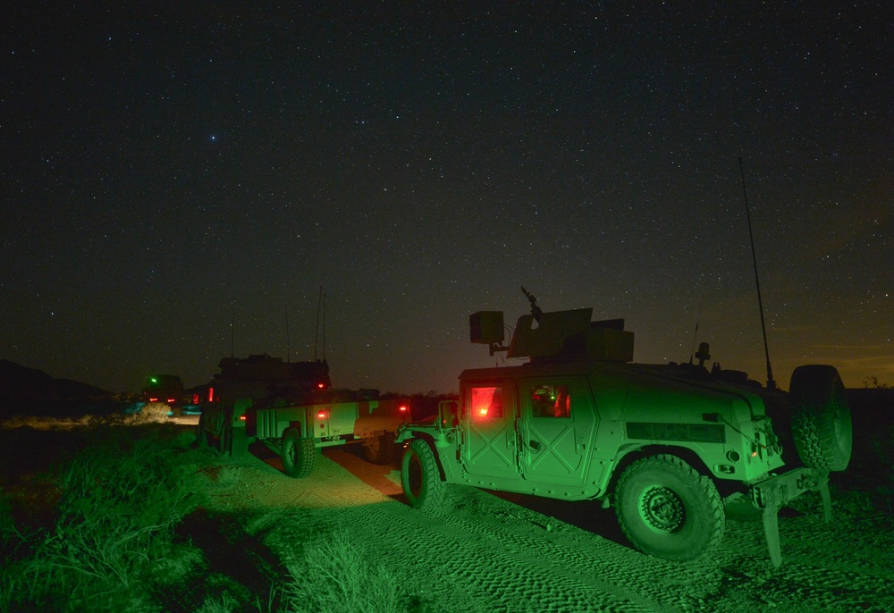 Humvees move in convoy