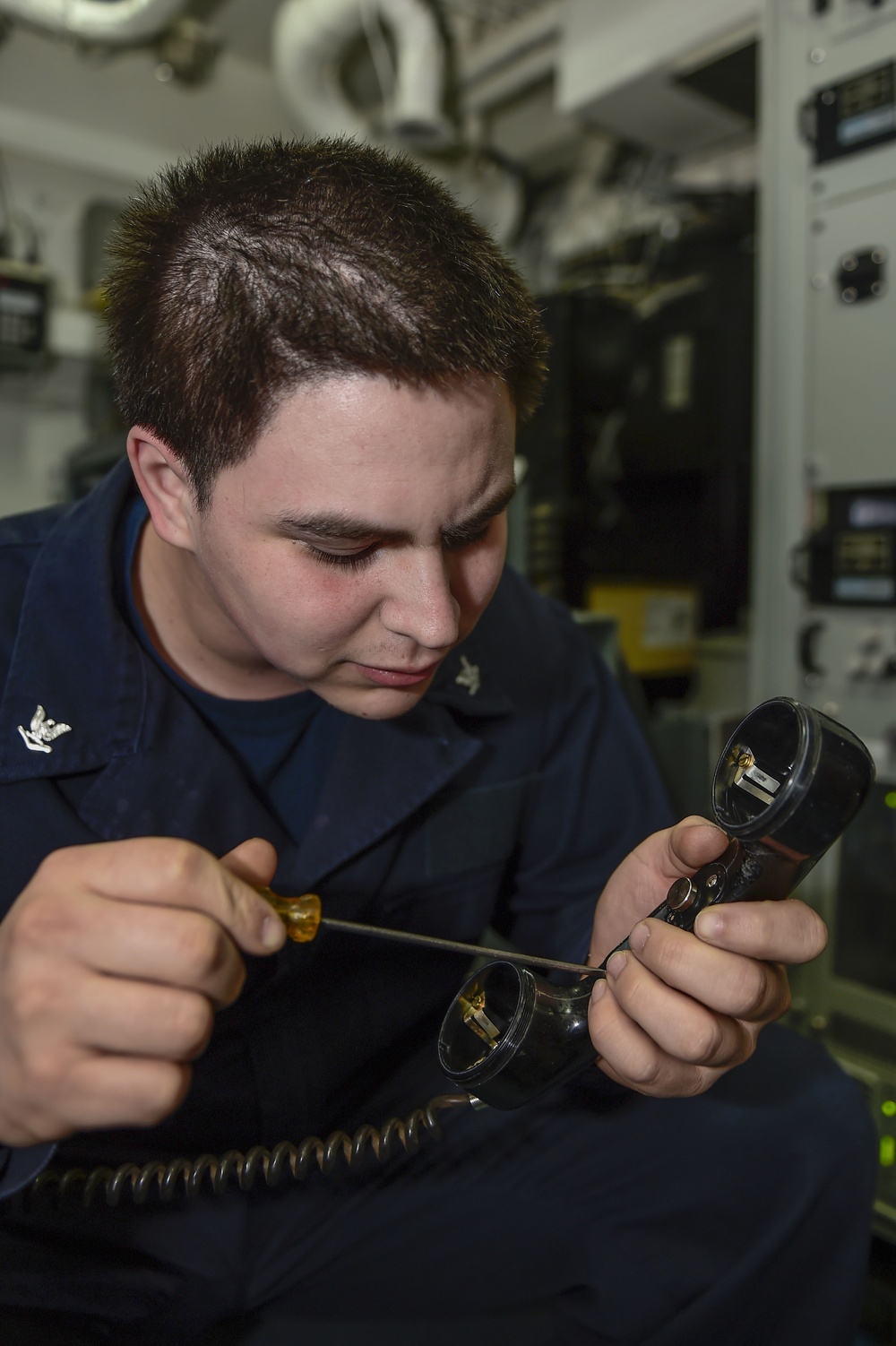 USS Carney sailor at work