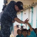 Stennis sailors participate in community relations event with elementary students in Guam
