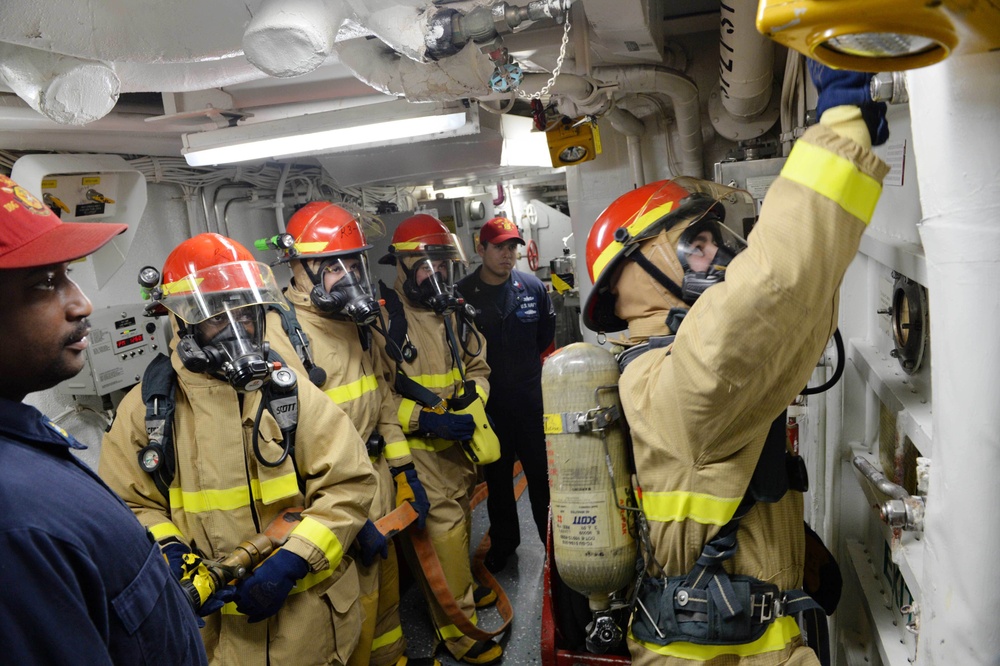 Simulated fire drill aboard USS Ross