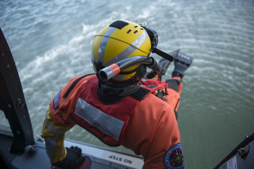 Petty Officer 3rd Class Robert Santoyo deploys into the San Francisco Bay