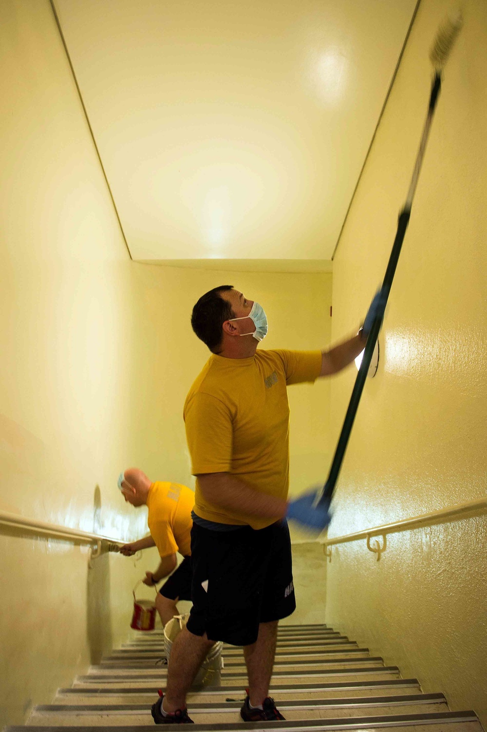 USS Mobile Bay sailors paint during community service