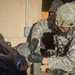 Civil affairs Soldier provides medical care to simulated patient