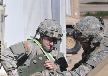 Meshing mechanics: Reserve mechanics repair vehicles alongside active duty components at JRTC 16-04