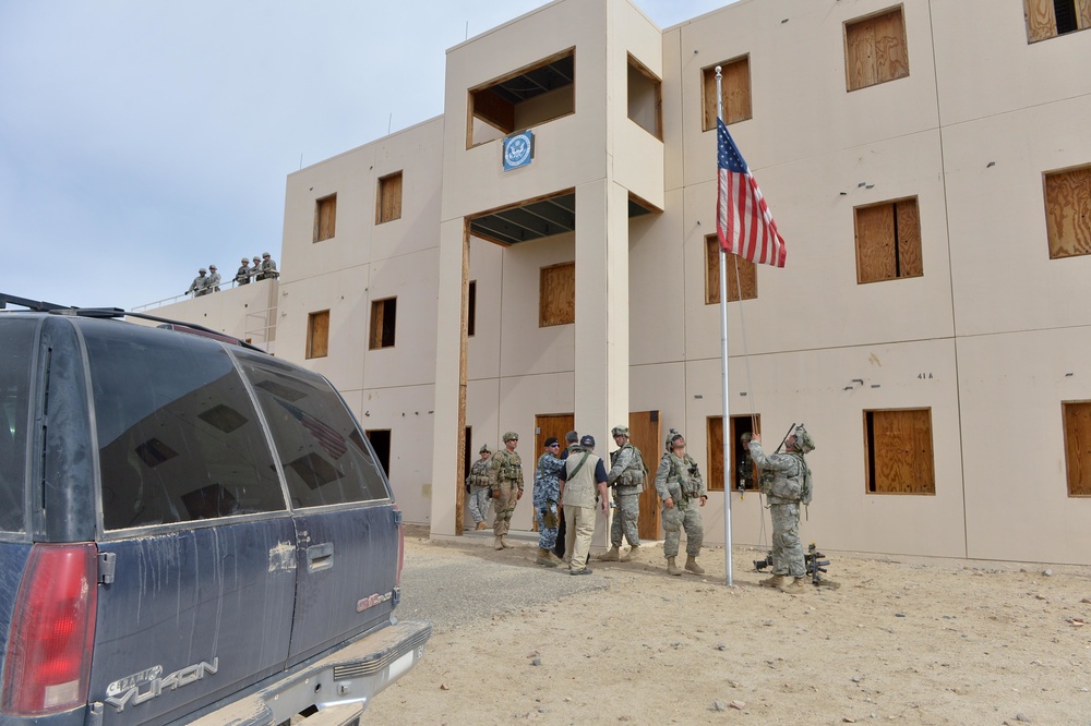 3d Cavalry Soldiers lower flag