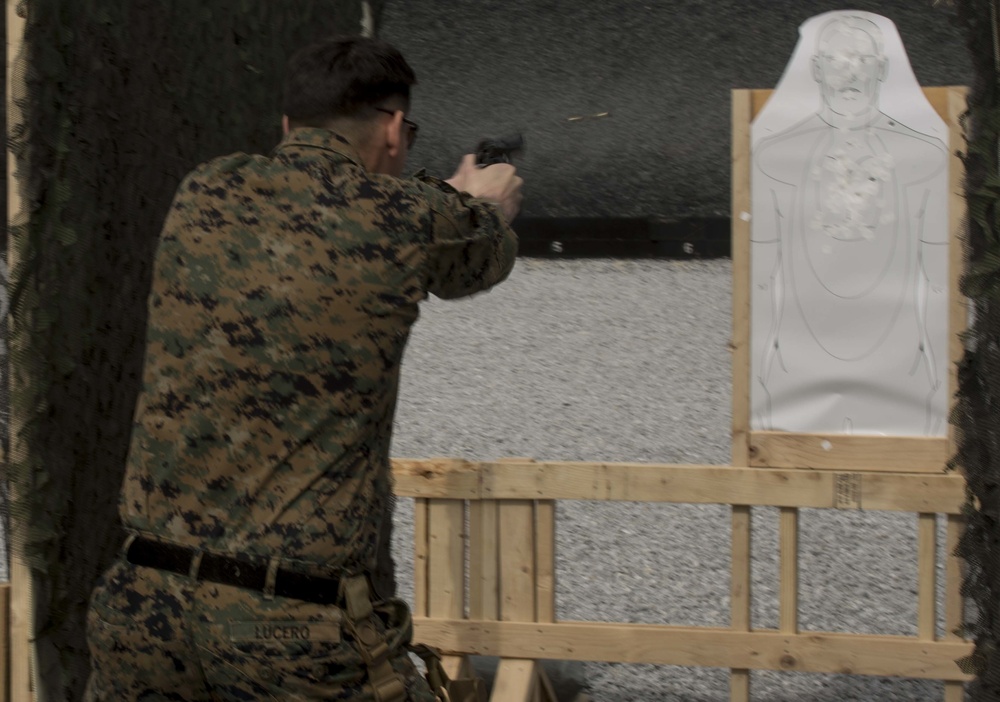 Marine Corps Combat Shooting Team members coach shooting competition