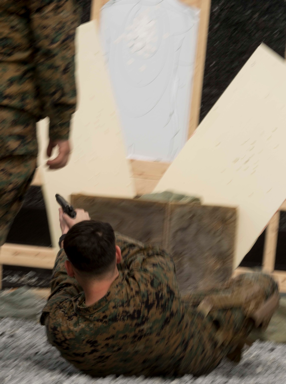 Marine Corps Combat Shooting Team members coach shooting competition