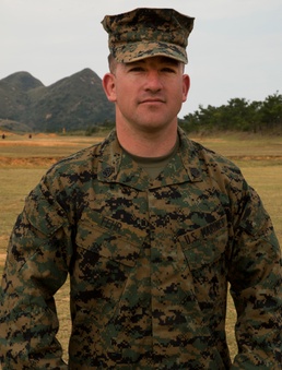 Marine Corps Combat Shooting Team members coach shooting competition