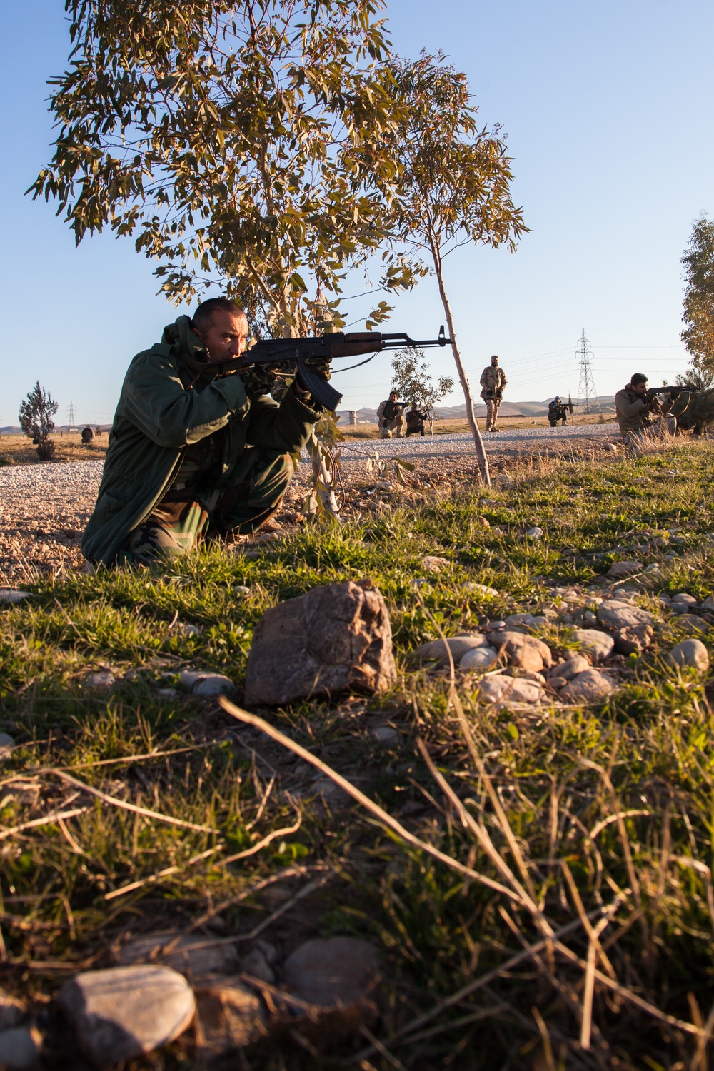 Peshmerga soldiers practice urban patrols and defense tactics under the supervision of German trainers