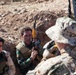 Peshmerga soldiers practice urban patrols and defense tactics under the supervision of German trainers