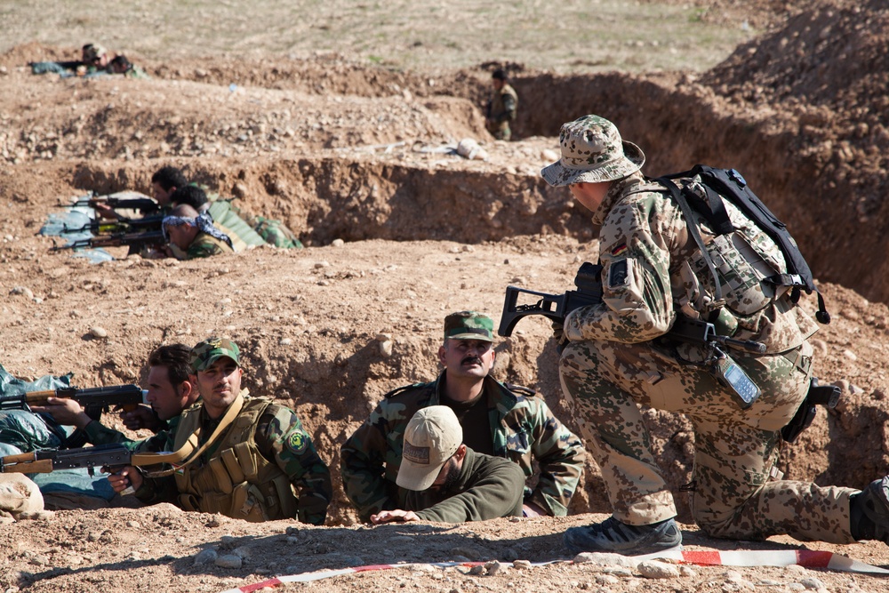 Peshmerga soldiers practice urban patrols and defense tactics under the supervision of German trainers